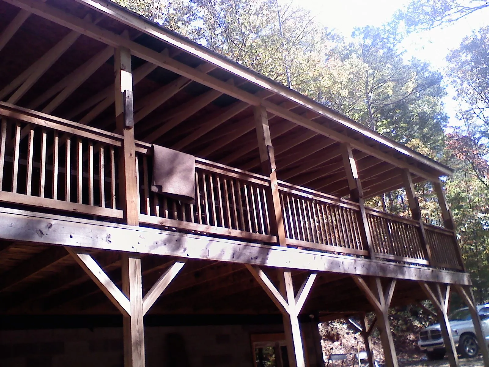 Timber framing under a new elevated porch and deck — Roof Leak Repair in Mount Upton by Roofing Brothers